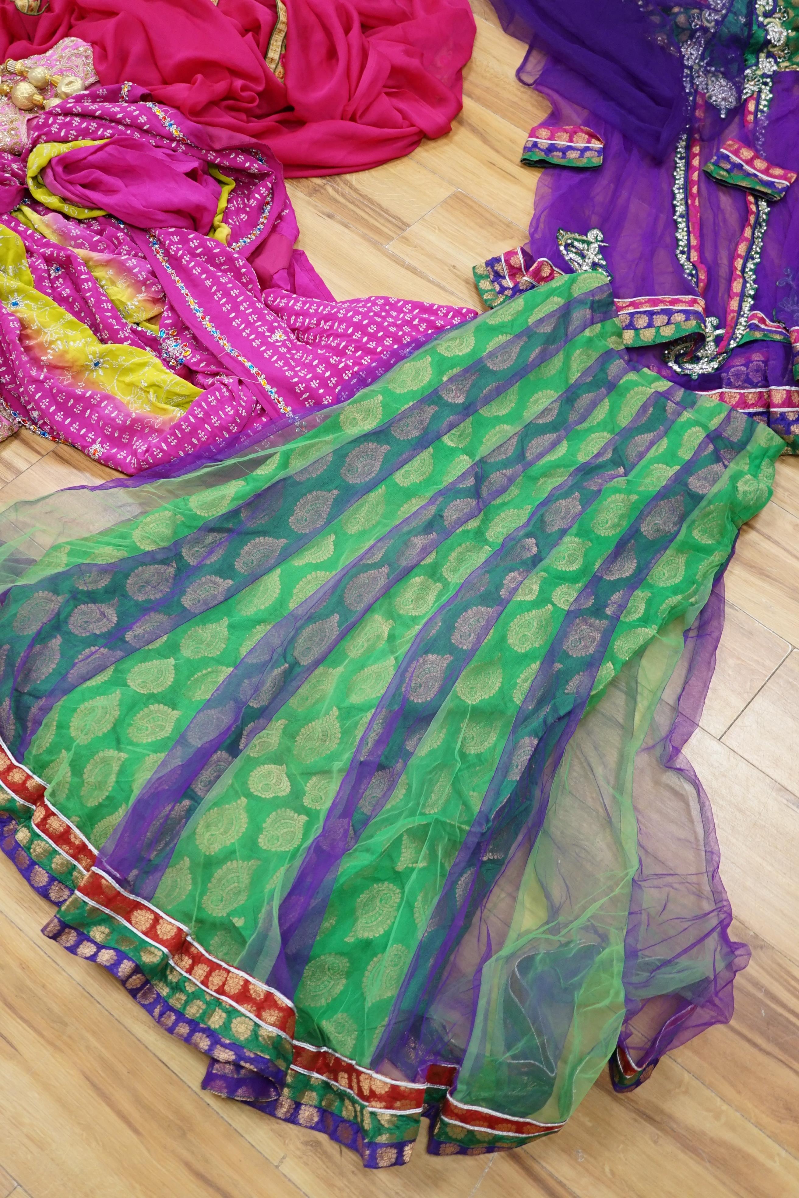 A collection of Indian silk saris and costume possibly bridal